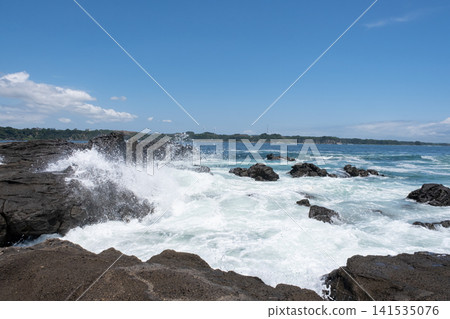Rough waves crashing against the rocks of Jogashima Island on the Miura Peninsula, creating a sea spray. Rough waves crashing against the rocks of Jogashima Island on the Miura Peninsula, creating a sea spray. 141535076