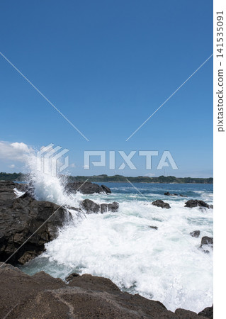 Rough waves crashing against the rocks of Jogashima Island on the Miura Peninsula, creating a sea spray. Rough waves crashing against the rocks of Jogashima Island on the Miura Peninsula, creating a sea spray. 141535091