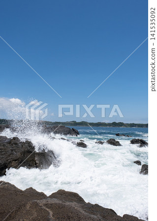 Rough waves crashing against the rocks of Jogashima Island on the Miura Peninsula, creating a sea spray. Rough waves crashing against the rocks of Jogashima Island on the Miura Peninsula, creating a sea spray. 141535092