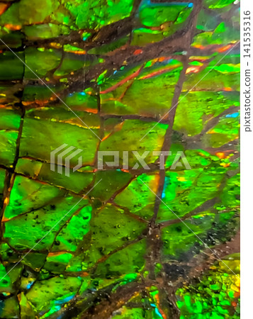 A fantastical mineral texture that captures the vibrant shimmer of green opal. A fantastical mineral texture that captures the vibrant shimmer of green opal. 141535316