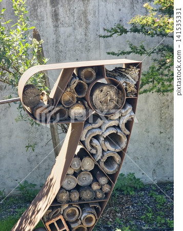 Cordoba, Argentina - April 12, 2026: Wooden Nesting Module of an Insect Hotel 141535331