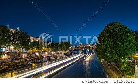 View to Pont des Arts in Paris after sunset day to night timelapse, France View to Pont des Arts in Paris after sunset day to night timelapse, France 141536153