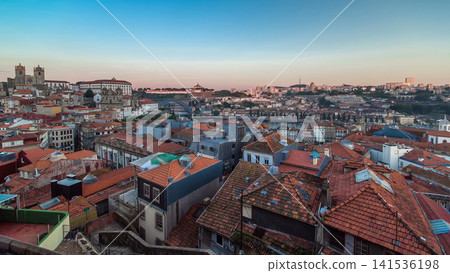 Sunset time, shadow covering Douro riverside with the Dom Luiz bridge timelapse, Porto , Portugal. Sunset time, shadow covering Douro riverside with the Dom Luiz bridge timelapse, Porto , Portugal. 141536198