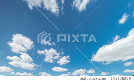 Beautiful blue sky timelapse with soft white clouds moving forward. Beautiful blue sky timelapse with soft white clouds moving forward. 141536239