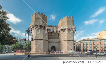 Serrans Towers or Torres de Serranos timelapse hyperlapse in Valencia, Spain. Serrans Towers or Torres de Serranos timelapse hyperlapse in Valencia, Spain. 141536245