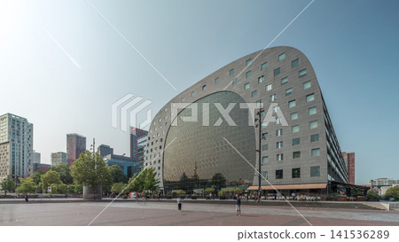 Hyperlapse of the Rotterdamse Markthal's exterior with shops and restaurants. Netherlands Hyperlapse of the Rotterdamse Markthal's exterior with shops and restaurants. Netherlands 141536289