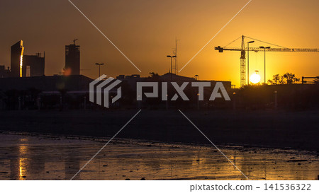Seaside skyline of Kuwait city sunrise timelapse Seaside skyline of Kuwait city sunrise timelapse 141536322