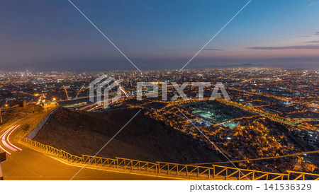 Aerial view of Lima skyline day to night timelapse from San Cristobal hill. Aerial view of Lima skyline day to night timelapse from San Cristobal hill. 141536329