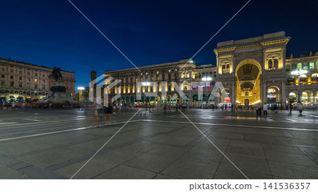 Monument to Vittorio Emanuele II and Galleria Vittorio Emanuele II day to night timelapse on the Piazza del Duomo Monument to Vittorio Emanuele II and Galleria Vittorio Emanuele II day to night timelapse on the Piazza del Duomo 141536357