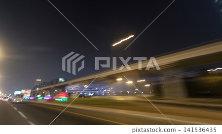 Drive on Sheikh Zayed Road in Dubai at night, United Arab Emirates timelapse 141536435