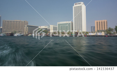 Excursion on traditional Abra boat at the creek in Dubai, UAE timelapse Excursion on traditional Abra boat at the creek in Dubai, UAE timelapse 141536437
