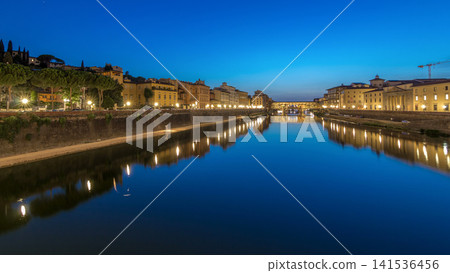 River Arno and famous bridge Ponte Vecchio day to night timelapse after sunset in Florence, Tuscany, Italy River Arno and famous bridge Ponte Vecchio day to night timelapse after sunset in Florence, Tuscany, Italy 141536456