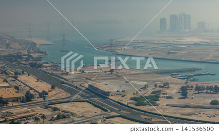 Skylines under the thick fog at the street timelapse of Abu Dhabi at morning Skylines under the thick fog at the street timelapse of Abu Dhabi at morning 141536500