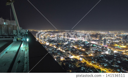 Cityscape of Ajman from rooftop night aerial timelapse Cityscape of Ajman from rooftop night aerial timelapse 141536511