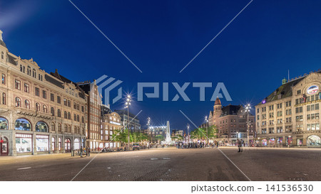The Dam square in Amsterdam day to night timelapse panorama, The Netherlands. The Dam square in Amsterdam day to night timelapse panorama, The Netherlands. 141536530