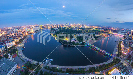 Elevated view over the city center with river and park and central business district day to night Timelapse, Kazakhstan, Astana Elevated view over the city center with river and park and central business district day to night Timelapse, Kazakhstan, Astana 141536535