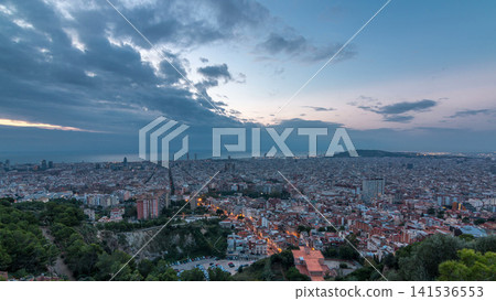 Panorama of Barcelona night to day timelapse, Spain, viewed from the Bunkers of Carmel Panorama of Barcelona night to day timelapse, Spain, viewed from the Bunkers of Carmel 141536553