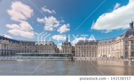Place de la Bourse and Miroir d'eau timelapse hyperlapse in Bordeaux, France, reflecting historic architecture Place de la Bourse and Miroir d'eau timelapse hyperlapse in Bordeaux, France, reflecting historic architecture 141536557