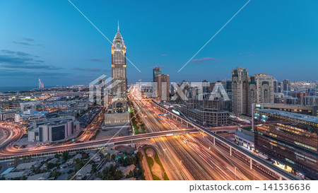 Skyline internet city with crossing Sheikh Zayed Road aerial day to night timelapse Skyline internet city with crossing Sheikh Zayed Road aerial day to night timelapse 141536636