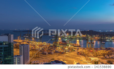 Commercial port of Singapore aerial day to night timelapse. Commercial port of Singapore aerial day to night timelapse. 141536690