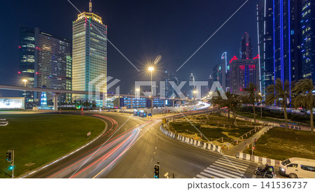 Traffic on intersection and bridge at the Sheikh Zayed Road day to night timelapse Traffic on intersection and bridge at the Sheikh Zayed Road day to night timelapse 141536737