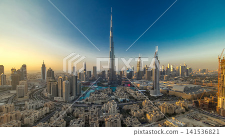 Dubai Downtown at evening timelapse view from the top in Dubai, United Arab Emirates Dubai Downtown at evening timelapse view from the top in Dubai, United Arab Emirates 141536821