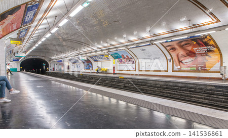 Paris Metro platform timelapse. It is the one of the largest underground system in the world. Paris, France Paris Metro platform timelapse. It is the one of the largest underground system in the world. Paris, France 141536861