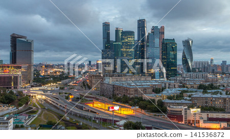 Night to day view of the city traffic timelapse and Building of Moscow International Business Center Moscow-City Night to day view of the city traffic timelapse and Building of Moscow International Business Center Moscow-City 141536872