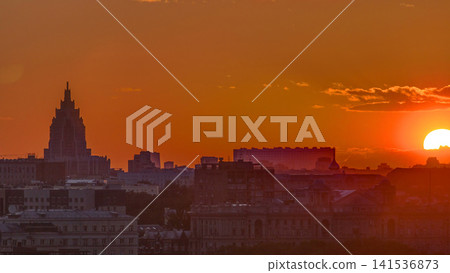Panorama with Stalin skyscraper during sunset timelapse in Moscow, Russia Panorama with Stalin skyscraper during sunset timelapse in Moscow, Russia 141536873