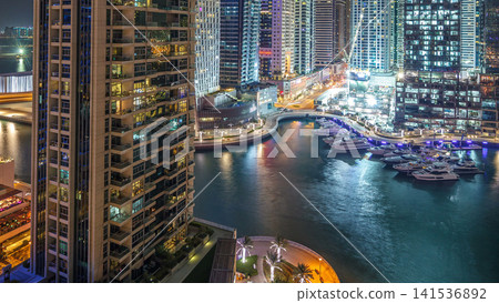 Dubai Marina at night timelapse, Glittering lights and tallest skyscrapers Dubai Marina at night timelapse, Glittering lights and tallest skyscrapers 141536892