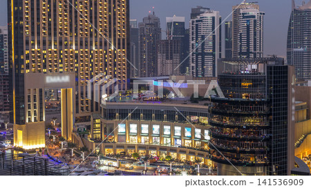 Beautiful aerial top view day to night transition timelapse of Dubai Marina canal Beautiful aerial top view day to night transition timelapse of Dubai Marina canal 141536909