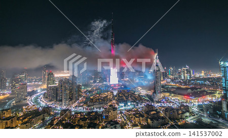 Dubai Burj Khalifa New Year fireworks celebration timelapse and the Fire accident at Dubai, UAE. Dubai Burj Khalifa New Year fireworks celebration timelapse and the Fire accident at Dubai, UAE. 141537002