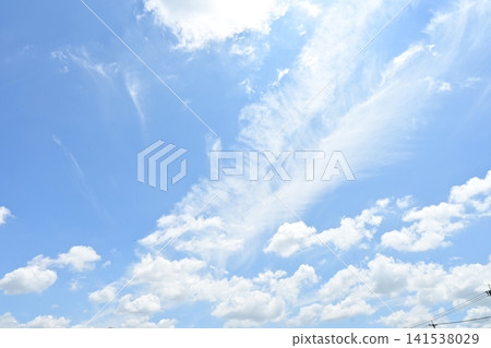 White clouds and a beautiful blue sky 141538029