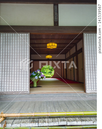 Traditional Japanese temple interior with circular window in Kamakura 141539567