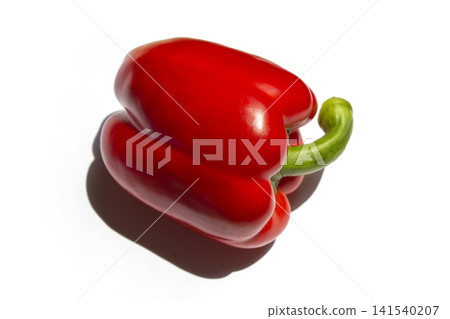 It is a bell pepper placed on a white background. It is a bell pepper placed on a white background. 141540207