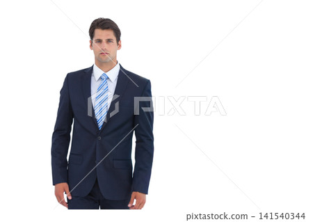 Man wearing fitted navy two-piece suit standing against white seamless backdrop on left, copy space Man wearing fitted navy two-piece suit standing against white seamless backdrop on left, copy space 141540344
