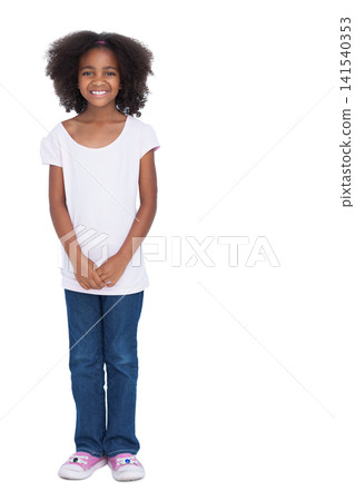African American child girl posing smiling in studio in white top jeans pink cartoon shoes headband African American child girl posing smiling in studio in white top jeans pink cartoon shoes headband 141540353