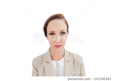 Professional woman posing, facing camera in studio wearing beige blazer white blouse liner lipstick Professional woman posing, facing camera in studio wearing beige blazer white blouse liner lipstick 141540361