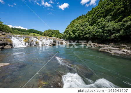 A spectacular view of Yokotaki, which has abundant water flowing downstream of the Kikuchi Gorge A spectacular view of Yokotaki, which has abundant water flowing downstream of the Kikuchi Gorge 141541407