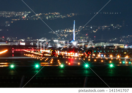 An airplane preparing to take off from Itami Airport. An airplane preparing to take off from Itami Airport. 141541707