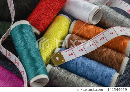 Colorful Sewing Threads and Measuring Tape. 141544059