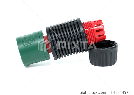 Drainage pipe component with green connector and red threaded end cap Drainage pipe component with green connector and red threaded end cap 141544571