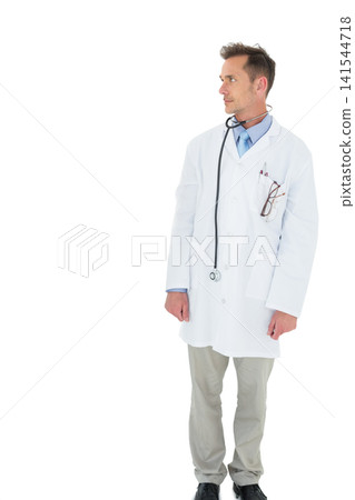 Mature male physician standing facing left in studio wearing lab coat, stethoscope, copy space Mature male physician standing facing left in studio wearing lab coat, stethoscope, copy space 141544718