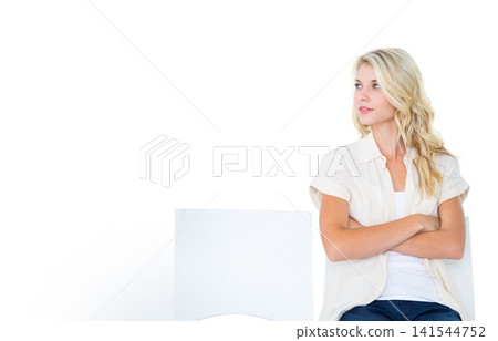 Adult female sitting on white chair in high-key studio, crossing arms, looking right, copy space Adult female sitting on white chair in high-key studio, crossing arms, looking right, copy space 141544752