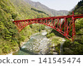 red bridge over the valley 141545474