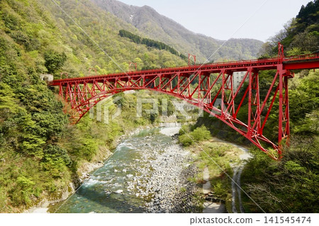 red bridge over the valley 141545474
