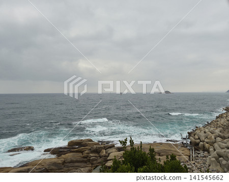 A landscape of a cloudy sky and the sea A landscape of a cloudy sky and the sea 141545662