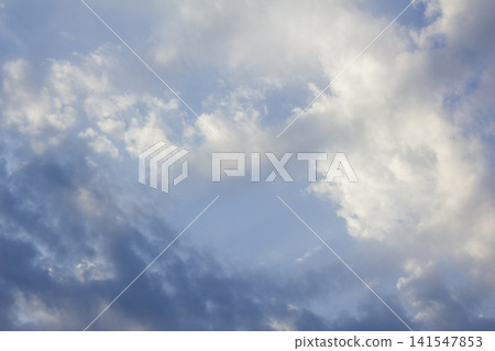 It is a cloudy late afternoon sky. It is a cloudy late afternoon sky. 141547853