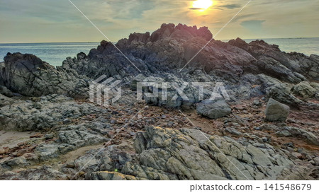 Rocky Beach Shoreline Landscape at Sunset Light 141548679