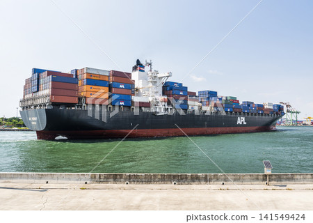 The container ship of APL Shipping is sailing into Kaohsiung Second Harbor, Taiwan. The container ship of APL Shipping is sailing into Kaohsiung Second Harbor, Taiwan. 141549424